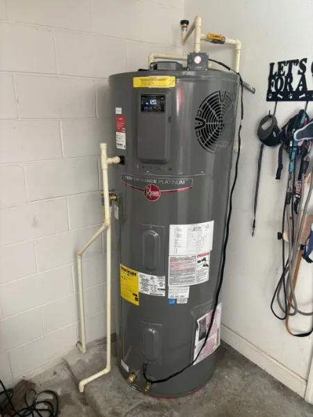Gas water heater piped and vented in a home utility room