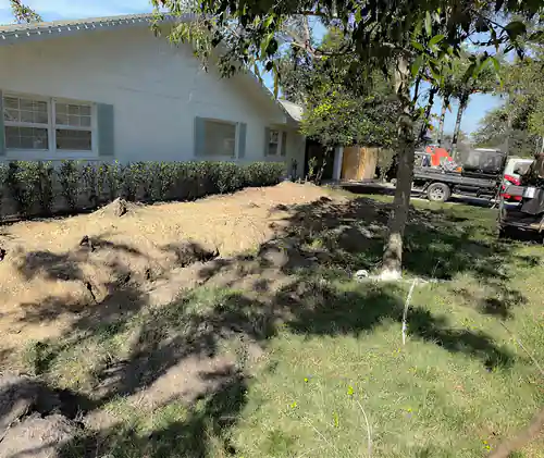 Open yard trench for a new sewer lateral at an Altamonte Springs property