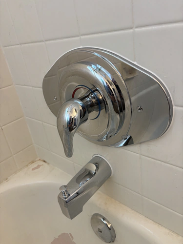 New chrome tub and shower trim and diverter spout fitted on an Orlando bathroom job