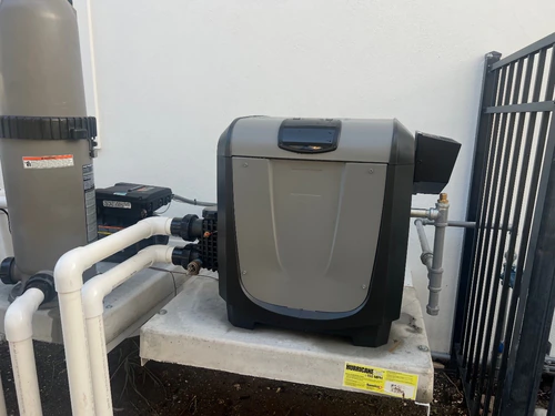 Exterior gas connector and piping installed for equipment at a Windermere home