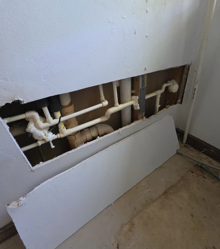 New CPVC repipe lines run through an open wall on an Altamonte Springs home