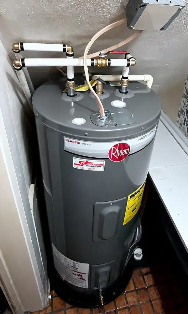 New water heater installed and connected in a Windermere utility room